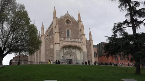 Almudena Cathedral in Madrid viewed from below with dramatic cloudy sky 動画素材 334292435