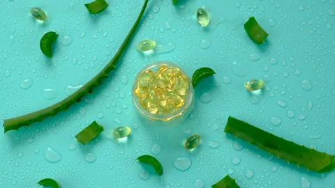 Aloe vera extract and capsules. Selective focus. Stock Footage 304901460