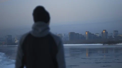 Alone athlete reaching destination point on city river bank. Goal achievement Stock Footage 102323242