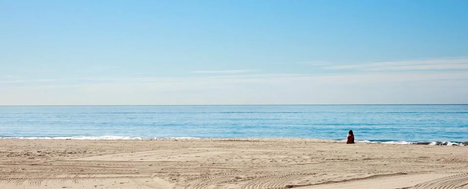 Alone on the beach Stock Photos