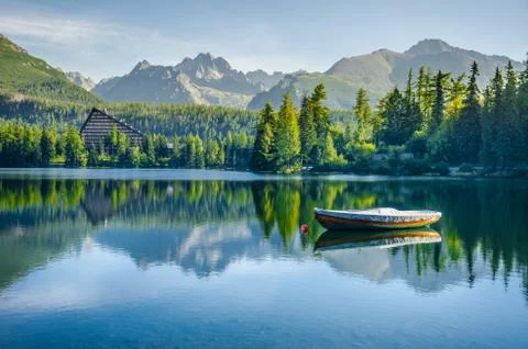 Alone Boat on empty Mountain lake Strbske pleso in National Park High Tatra,  Stock Photos