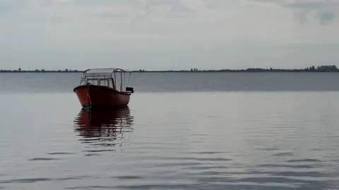 Alone boat is on the water Stock Footage 83259681