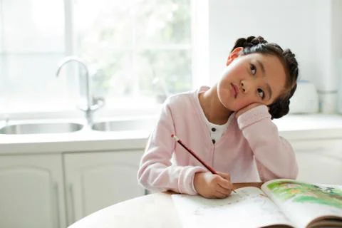 Alone Children Thinking 5 to 10. Sitting Asia Asians girl Learning Oriental Stock Photos