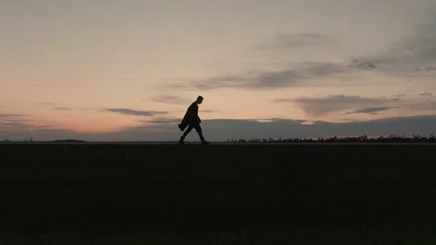 Alone Lonely Man Walking. Road. Sunset. Silhouette. Stock Footage 165396464