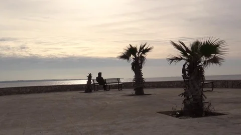 Alone Man Sitting Looking At Sea Stock Footage 71624425