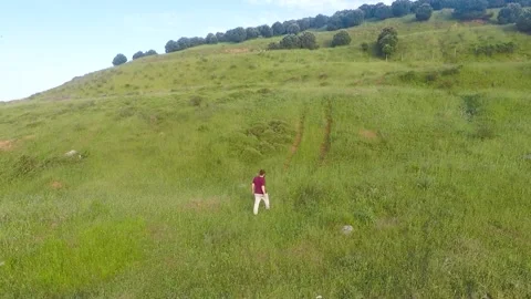 Alone man walking nature Stock Footage 197087928