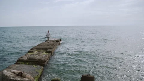 Alone Man walks on the pier Stock-Footage 152558146