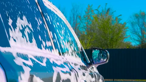 Alone professional car wash with detergent foam. Stock Footage 281795519