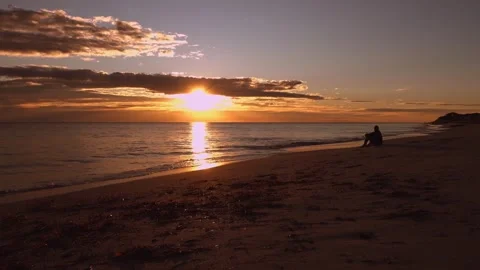 Alone at sunset Stock Footage 282856852