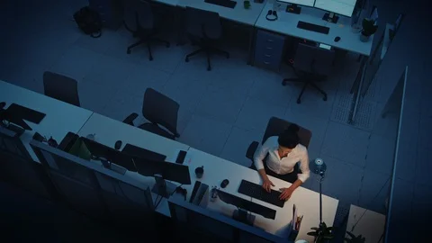 Alone Working Late at Night in the Office: Businesswoman Using Desktop Computer 動画素材 106534972