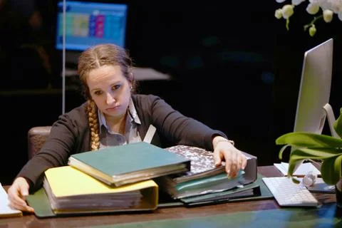 Alone working in office with a lot of documents. Yelling and screaming for ba Stock Photos