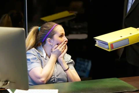 Alone working in office with a lot of documents. Yelling and screaming for ba Stock Photos