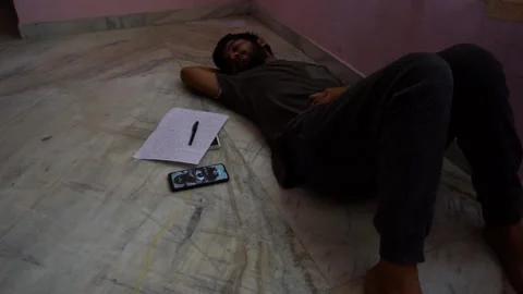 Alone writer sleeping after writing letter to nature in the pendemic and 스톡 동영상 137679965