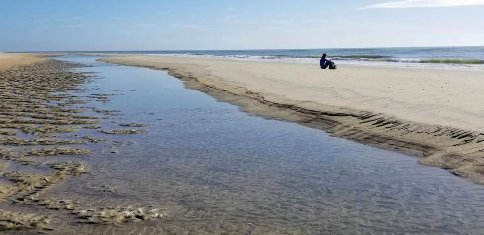 AloneOnBeach Stock Photos