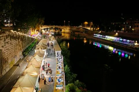 Along the Tiber River in Rome's summer nightlife. Stock Photos