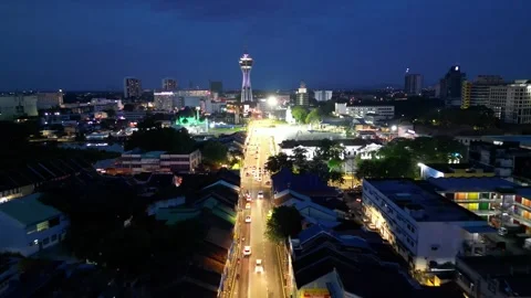 Alor Setar Tower seen from the sky against an urban backdrop. Видео 318096192