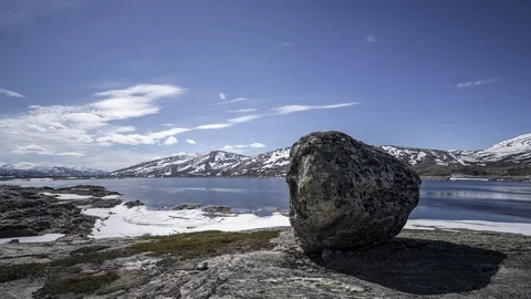 Aloun boulder over lake Stock Footage 87791502