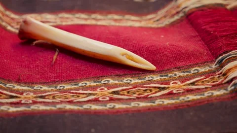 Alpaca Bone Tool Used by Quechua Artisans on Alpaca and Llama Wool Fabric. Video stock 277465943