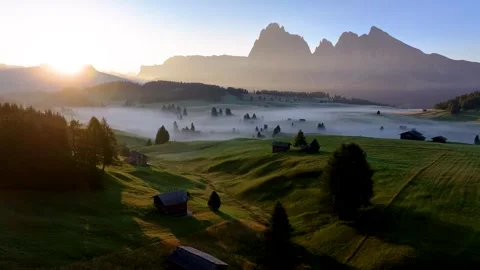 Alpe di Siusi (Forward Drone Shot) 03 | Sunrise | Italian Dolomites | Fog | 4K Stock Footage 259923710