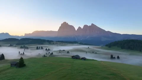 Alpe di Siusi (Forward Drone Shot) 01 | Sunrise | Italian Dolomites | Fog | 4K Stock Footage 259923916