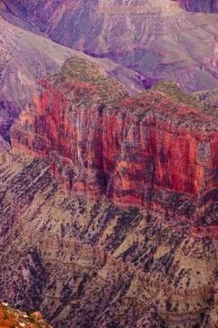 Alpenglow paints the cliffs Stock Photos