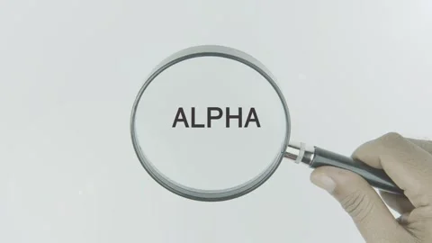 Alpha text or word highlighted by a magnifying glass in a hand on a white Stock Footage 303576878