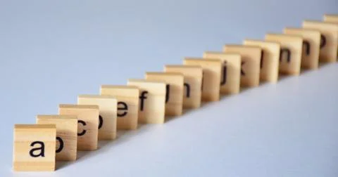 Alphabet on a blue background. Stock Photos