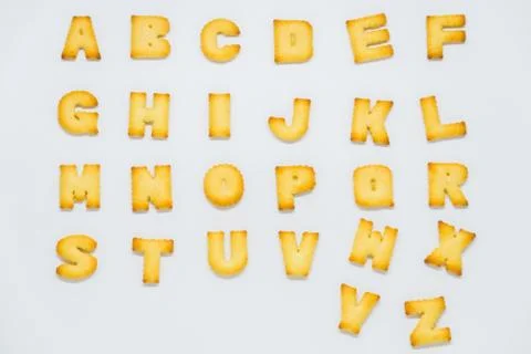 Alphabet cracker on white background 写真素材