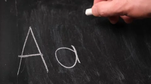 Alphabet lettering on blackboard Stock Footage 220161580