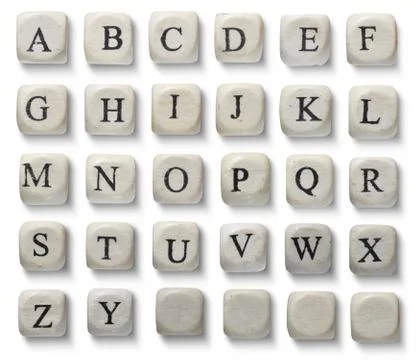 Alphabet letters on wooden pieces, isolated on white. Stock Photos