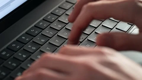 Alphanumeric Keys of the Laptop Keyboard Being Tapped by Fingers Stock Footage 286239944