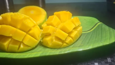 Alphonso mangoes, also known as Hapus, are celebrated for their vibrant saffron Stock Footage 310820518