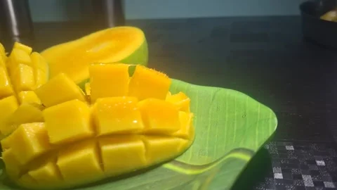 Alphonso mangoes, also known as Hapus, are celebrated for their vibrant saffron Stock Footage 310820564