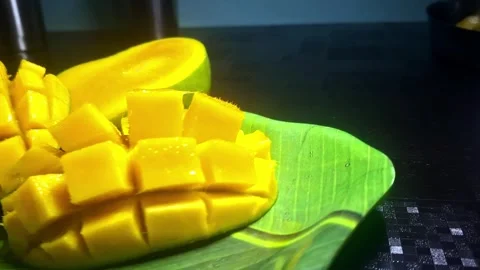 Alphonso mangoes, or Hapus, are prized for their golden-yellow skin Stock Footage 310826640