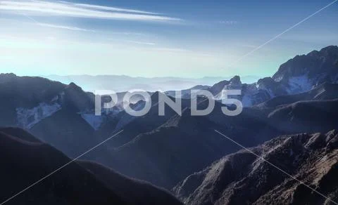 Alpi Apuane mountains and marble quarry view at sunset. Carrara, Tuscany, I.. Stock Photos