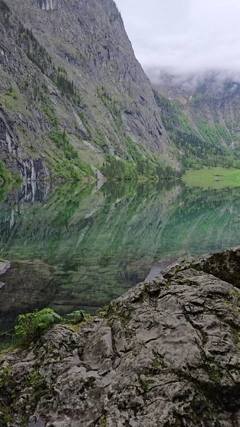 Alpine Calm – Reflections on Obersee in Upper Bavaria Stock Footage 309417740