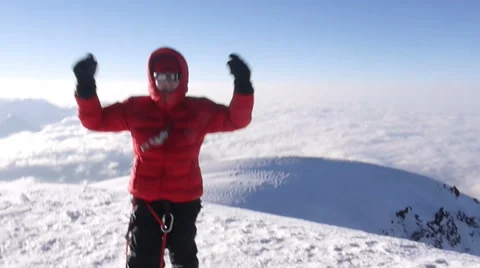 Alpine climber celebrates getting to top of kazbek mountain Stock Footage 43248948