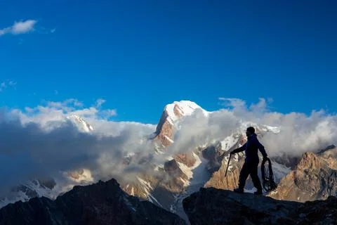 Alpine Climber Reaching Summit Stock Photos