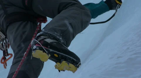 Alpine climbing boots ice breaking Stock Footage 47313809