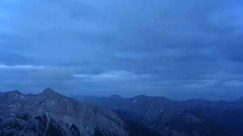 Alpine Clouds and Lunar Eclipse Stock Footage 52390931