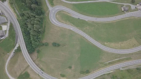Alpine curvy road on top of the mountain Video stock 93435802