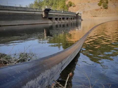 Alpine dam pipe and valve system Stock Photos