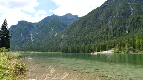 Alpine Dolomite scenery at Lake Dobbacio, Italy Stock Footage 320843174