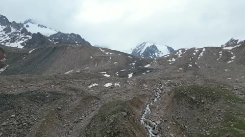 Alpine glacier stream on the trail to Titov Lake, Kazakhstan Stock Footage 340452341