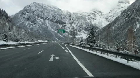 Alpine high mountain road highway driving snowy Alps snow winter Austria video Vidéo 58959515