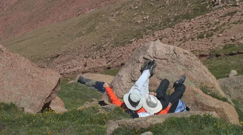 Alpine hikers enjoy view  Stock Footage 1062542