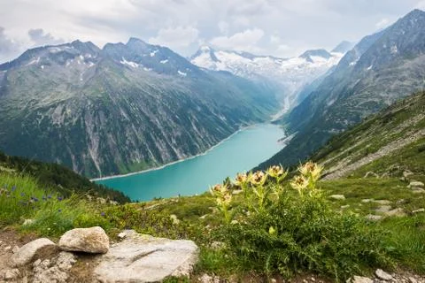 Alpine lake below Stock Photos