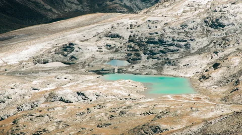 Alpine lake with cloud shadows passing Video stock 61240263