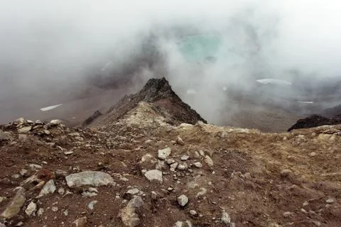Alpine lake in the clouds. Stock Photos