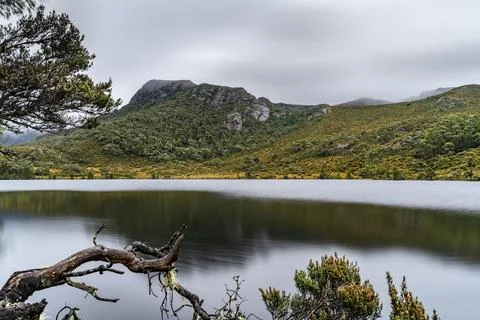 Alpine lake with mountain in the background Stock Photos